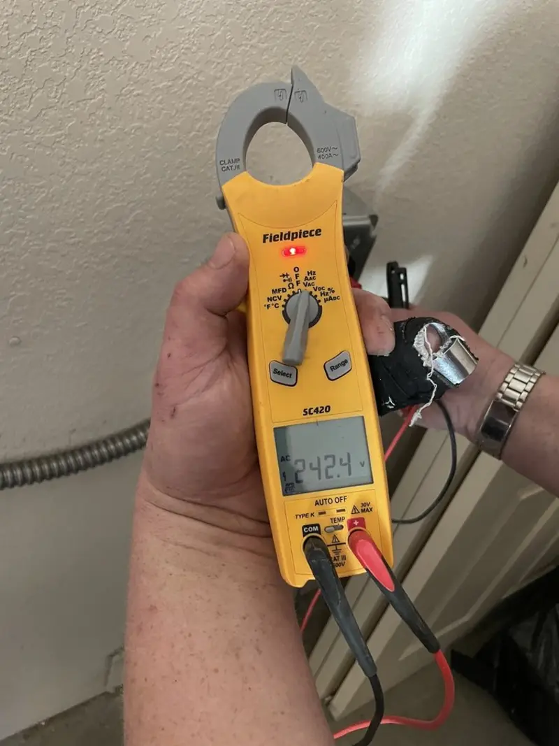 Voltage testing with clamp meter during Hot Tub / Pool Electrical Wiring in Standish